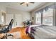 Bedroom featuring hardwood floors, natural light, and a dedicated workspace, creating a comfortable and functional space at 119 Hemphill Ave, Chester, SC 29706