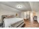 Bedroom features hardwood floors, a cozy bed, and natural light, creating a comfortable and inviting space at 119 Hemphill Ave, Chester, SC 29706