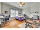 Bedroom with hardwood floors, natural light, desk area, and ceiling fan at 119 Hemphill Ave, Chester, SC 29706