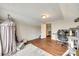 Bedroom featuring hardwood floors, a desk area, a reading nook, and access to other living spaces at 119 Hemphill Ave, Chester, SC 29706