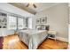 Bedroom featuring hardwood floors, natural light, and built in shelving at 119 Hemphill Ave, Chester, SC 29706
