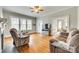 Bright living room with hardwood floors, large windows, and an open floor plan at 119 Hemphill Ave, Chester, SC 29706