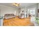 Inviting living room with hardwood floors, a fireplace, and comfortable seating at 119 Hemphill Ave, Chester, SC 29706