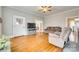 Cozy living room featuring hardwood floors, neutral walls, and ample natural light at 119 Hemphill Ave, Chester, SC 29706
