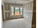 Unfinished bedroom features multiple windows providing lots of natural light, and blank canvas walls at 13248 Chopin Ridge Rd, Huntersville, NC 28078