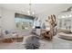 Adorable Bedroom with a playful mural, stylish zebra rug, and comfortable rocking chair at 13248 Chopin Ridge Rd, Huntersville, NC 28078