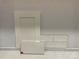 Sample of tiles and a white cabinet door against a textured background, perfect for modern bathrooms at 13248 Chopin Ridge Rd, Huntersville, NC 28078