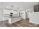 Well-equipped kitchen featuring an island, stainless steel appliances, and ample cabinet space at 143 Carriage Club Dr # 102, Mooresville, NC 28117