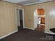 View of the Living Room showcasing the kitchen and views into other rooms at 146 Loomis St, Chester, SC 29706