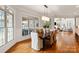 Bright dining room with large windows and an adjacent living space at 1506 Venetian Way Dr, Waxhaw, NC 28173