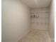 Unfinished basement space with wire shelving, ready for personalization and storage solutions at 1511 Liberty Ave, Albemarle, NC 28001