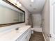 Bathroom features a vanity with marble countertop and shower with bathtub at 1511 Liberty Ave, Albemarle, NC 28001