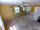 Bright bedroom featuring two windows, carpeted floors, and sconce lighting, creating a cozy atmosphere at 1552 10Th Street Nw Pl, Hickory, NC 28601