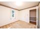 Bedroom with neutral walls, carpet, and natural light creating a comfortable living space at 1552 10Th Street Nw Pl, Hickory, NC 28601