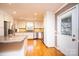 Well-lit eat-in kitchen features white cabinets, granite countertops, and stainless steel appliances at 1552 10Th Street Nw Pl, Hickory, NC 28601