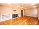 Bright living room boasts hardwood floors, built in cabinets and plenty of natural light at 1552 10Th Street Nw Pl, Hickory, NC 28601