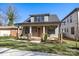Charming home featuring a cozy front porch and well-manicured lawn at 1824 Haines St, Charlotte, NC 28216