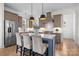 Gourmet kitchen with a large island, stainless appliances, and custom cabinetry at 1824 Haines St, Charlotte, NC 28216