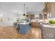 Gourmet kitchen with a large island, stainless appliances, and custom cabinetry at 1824 Haines St, Charlotte, NC 28216
