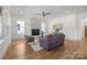 Cozy living room featuring a fireplace, recessed lights, and hardwood floors at 1824 Haines St, Charlotte, NC 28216