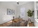 Sun-filled office features hardwood floors and abundant natural light at 1824 Haines St, Charlotte, NC 28216