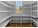 Large walk-in pantry with custom shelving, maximizing storage and organization at 1824 Haines St, Charlotte, NC 28216