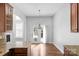 Open layout with granite counters, wood cabinets and large french doors at 3009 Scottcrest Way, Waxhaw, NC 28173