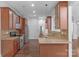 Kitchen with stainless steel appliances, granite countertops, and wooden cabinets at 3009 Scottcrest Way, Waxhaw, NC 28173