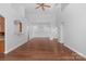 Spacious living room featuring hardwood floors, neutral walls, and an open layout at 3009 Scottcrest Way, Waxhaw, NC 28173