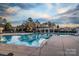 Resort-style pool with covered seating areas, perfect for relaxation and entertainment at 3009 Scottcrest Way, Waxhaw, NC 28173