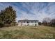 A large backyard with mature trees at 3029 Wendover Nw Rd, Concord, NC 28027