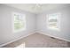 Bright bedroom with natural light from two windows at 3029 Wendover Nw Rd, Concord, NC 28027