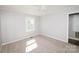 Bright bedroom with plush carpeting and a sunny window view at 3029 Wendover Nw Rd, Concord, NC 28027