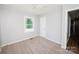 Bedroom featuring neutral walls, carpet, and a ceiling fan at 3029 Wendover Nw Rd, Concord, NC 28027