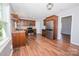 Bright kitchen featuring stainless steel appliances, wooden cabinets, and hardwood floors at 3029 Wendover Nw Rd, Concord, NC 28027
