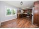 Spacious kitchen featuring hardwood floors, stainless steel appliances, and wooden cabinets at 3029 Wendover Nw Rd, Concord, NC 28027