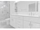 Bright bathroom with dual vanity, marble shower, and tile floor creating a luxurious space at 3816 Odom Way, Charlotte, NC 28216