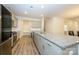 Bright and airy kitchen with a large island, stainless steel appliances, and modern finishes at 4242 Plumeria Way, Fort Mill, SC 29707