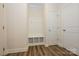 Well-organized mudroom with built-in storage and durable wood-look flooring at 4242 Plumeria Way, Fort Mill, SC 29707