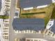 Aerial view of townhome rooftops, well-kept lawns, and neatly arranged parking spaces in a residential community at 6464 Park Pond Dr # 7, Charlotte, NC 28262