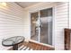 Balcony shows view into the home from a sliding glass door at 6464 Park Pond Dr # 7, Charlotte, NC 28262