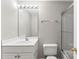 A neutral bathroom featuring a vanity, toilet, and shower/tub combo at 6464 Park Pond Dr # 7, Charlotte, NC 28262