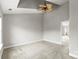 Empty bedroom has neutral color scheme and an open en suite bathroom at 6464 Park Pond Dr # 7, Charlotte, NC 28262