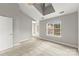 Large bedroom with vaulted ceilings, a window seat, and neutral carpeting at 6464 Park Pond Dr # 7, Charlotte, NC 28262