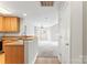 Open-concept kitchen flows into a dining and living area with lots of natural light at 6464 Park Pond Dr # 7, Charlotte, NC 28262