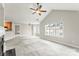 Open living space with fireplace, open access kitchen and lots of light at 6464 Park Pond Dr # 7, Charlotte, NC 28262