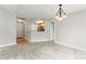 Open floor plan featuring living room area with an eat-in kitchen space at 6464 Park Pond Dr # 7, Charlotte, NC 28262