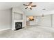 Open living space with fireplace, open access kitchen and lots of light at 6464 Park Pond Dr # 7, Charlotte, NC 28262