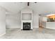 Cozy living room features a fireplace and an open concept design at 6464 Park Pond Dr # 7, Charlotte, NC 28262