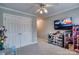 Cozy room featuring a ceiling fan, closet and fun decor at 649 46Th Avenue Ne Dr, Hickory, NC 28601